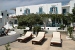 Hotel exterior with sun bed patio , Ageliki Pension, Platy Yialos, Sifnos, Cyclades, Greece
